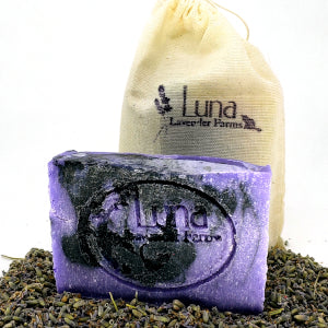 Purple and black lavender soap with charcoal swirled with logo